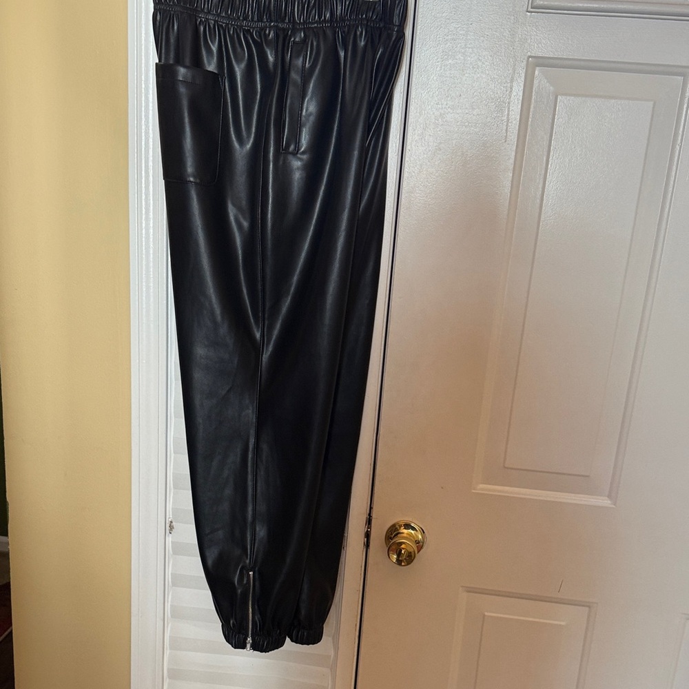 Women’s vegan leather pants in a size medium
